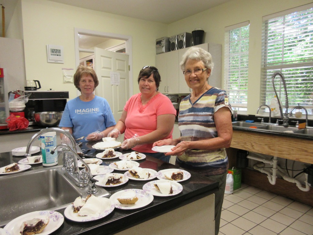 Church ladies serving dessert Montgomery County Women's Center